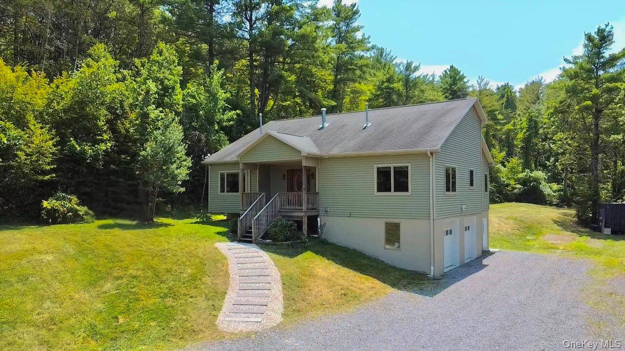 Private 6 acre Contemporary at Rock Ridge Estate Located on a secluded road, this beautifully updated home offers the perfect blend of modern comfort, nature, and serene country living.