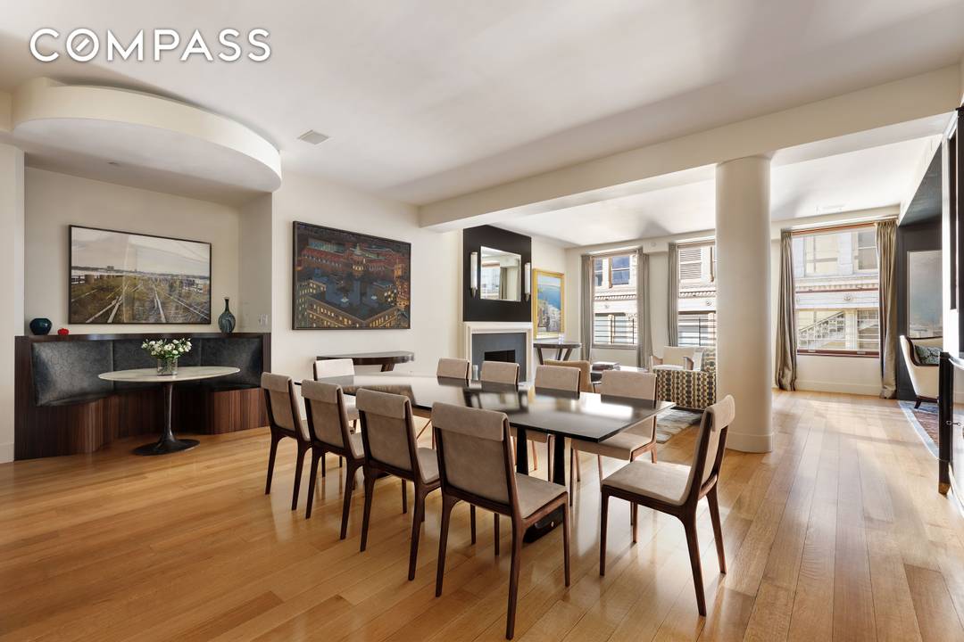 This exquisite triple mint residence enjoys a semi private elevator landing, boasts soaring 11.