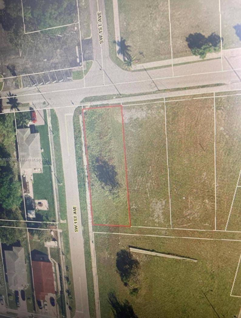 Fantastic opportunity on a desirable corner lot located just west of Dixie Highway and south of Hillsboro Boulevard.