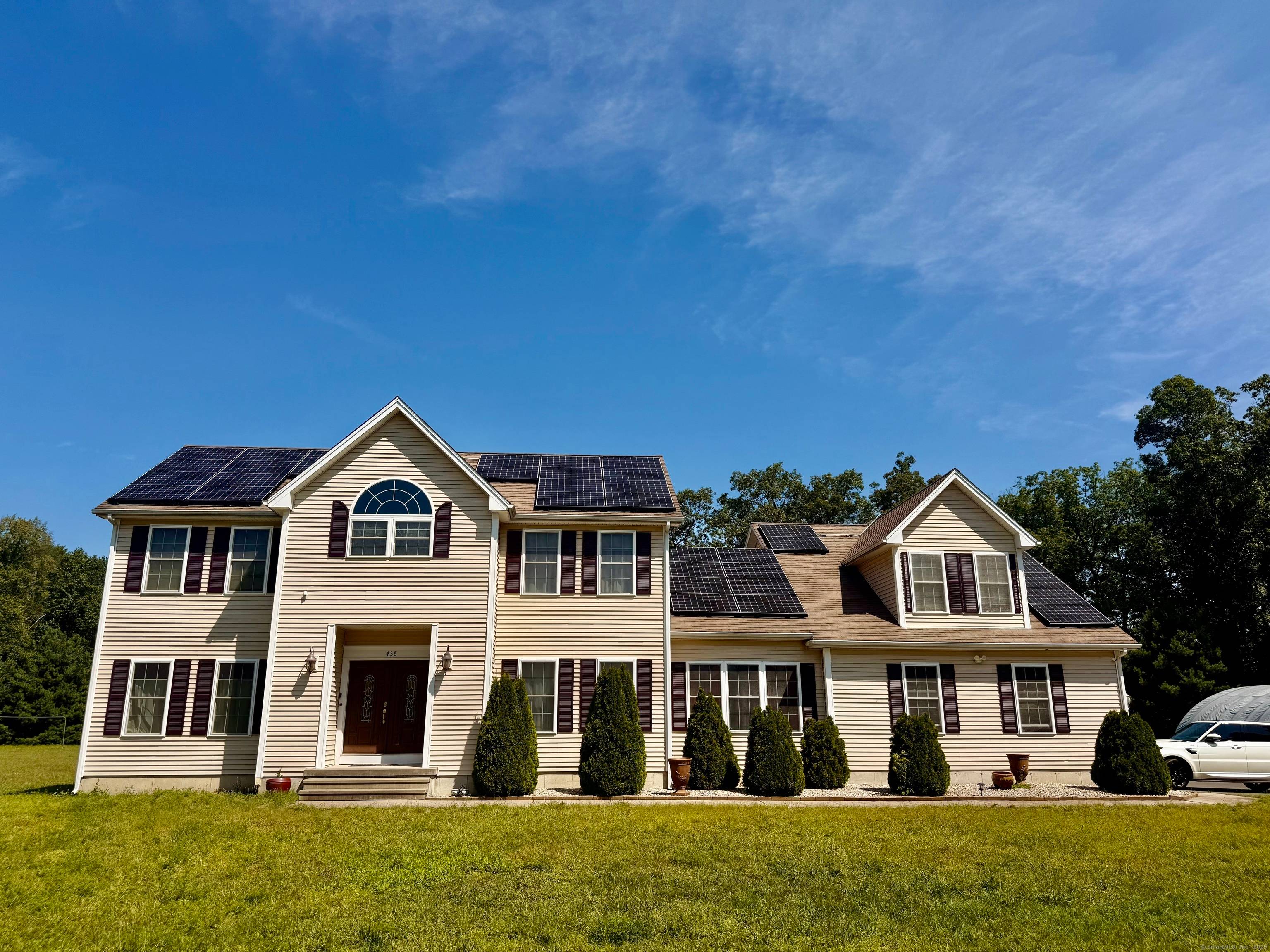 Stunning 5 Bedroom Home with an oversized extra room that can be used as an additional bedroom, family room or office.