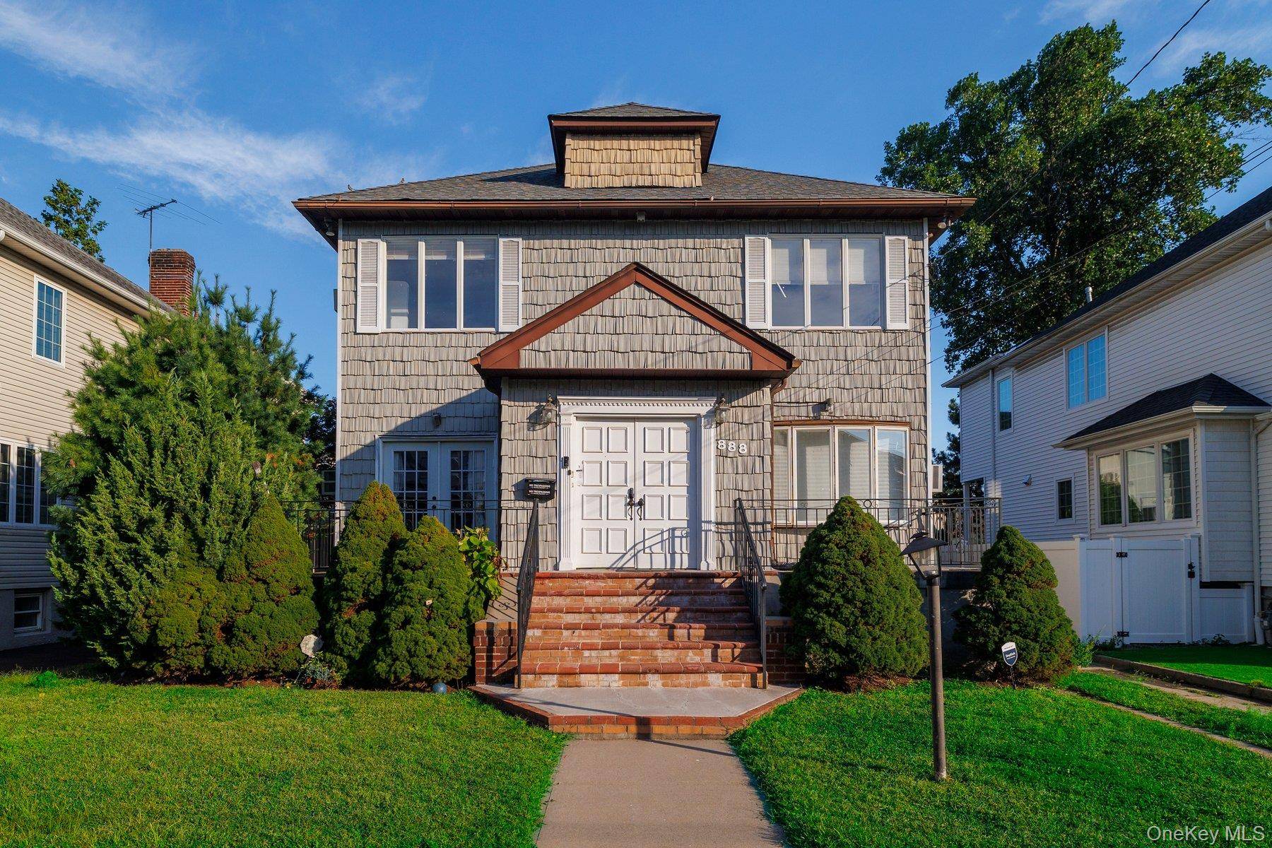 A center hall Woodmere Colonial in Woodmere.