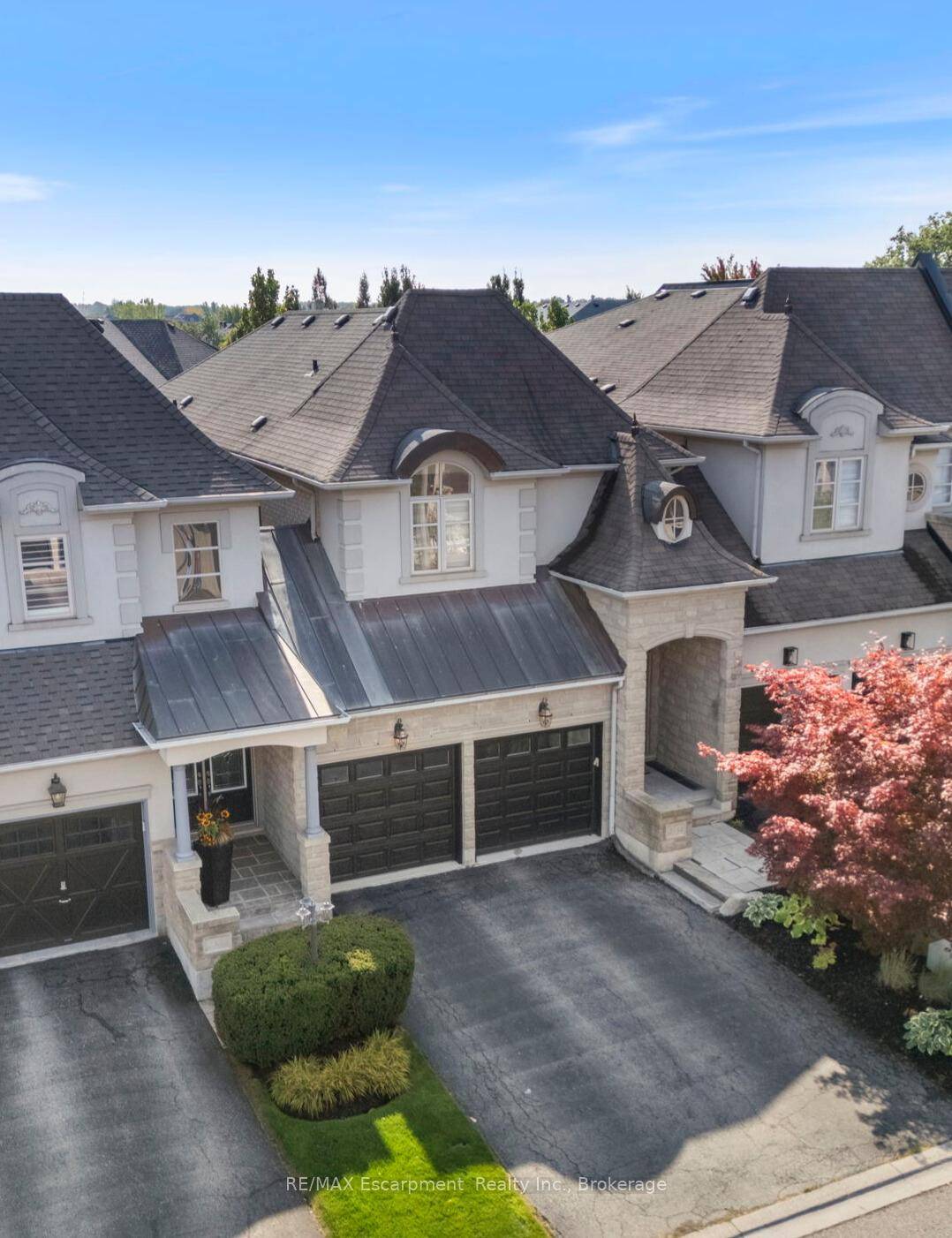 Highly sought after executive Freehold townhome by Fernbrook, attached only by the garage, showcasing the coveted Chateau Franc Model, known for its thoughtful design, natural flow, and expansive living spaces.