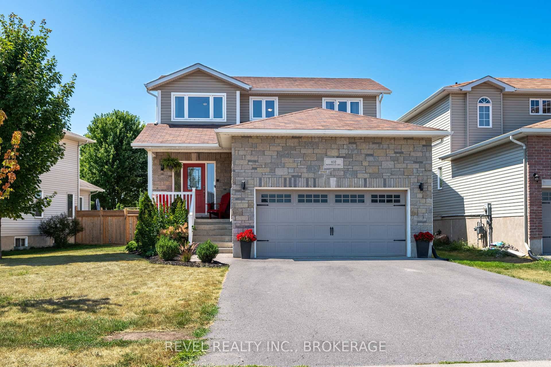 REVEL Realty is proud to present this beautiful two story home in the highly sought after Lakeside subdivision of Amherstview.