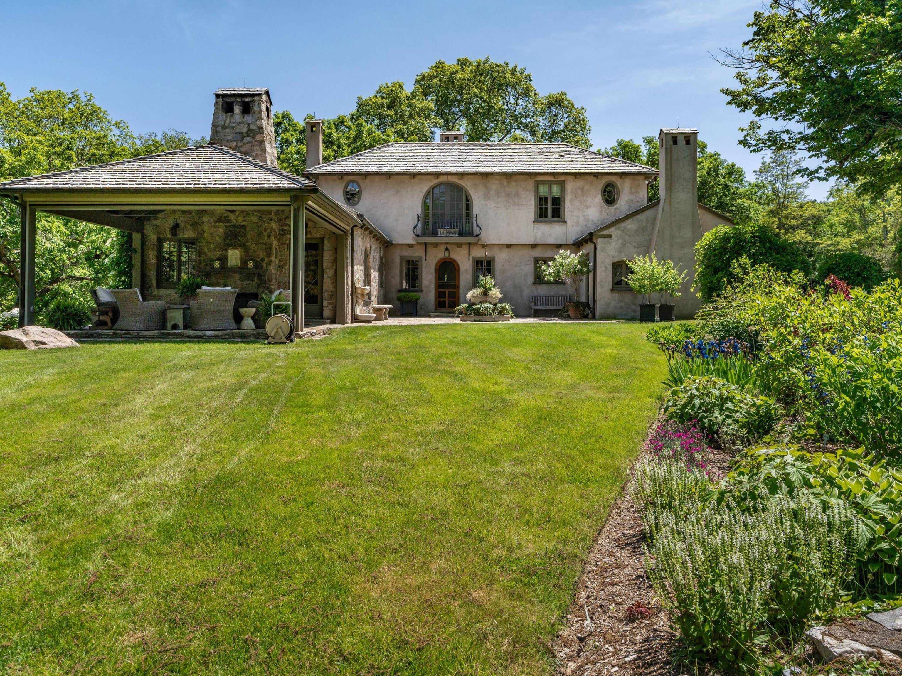 Overlooking the hills of Lyme, Connecticut, Hilltop Estate combines old world elegance with modern luxury.