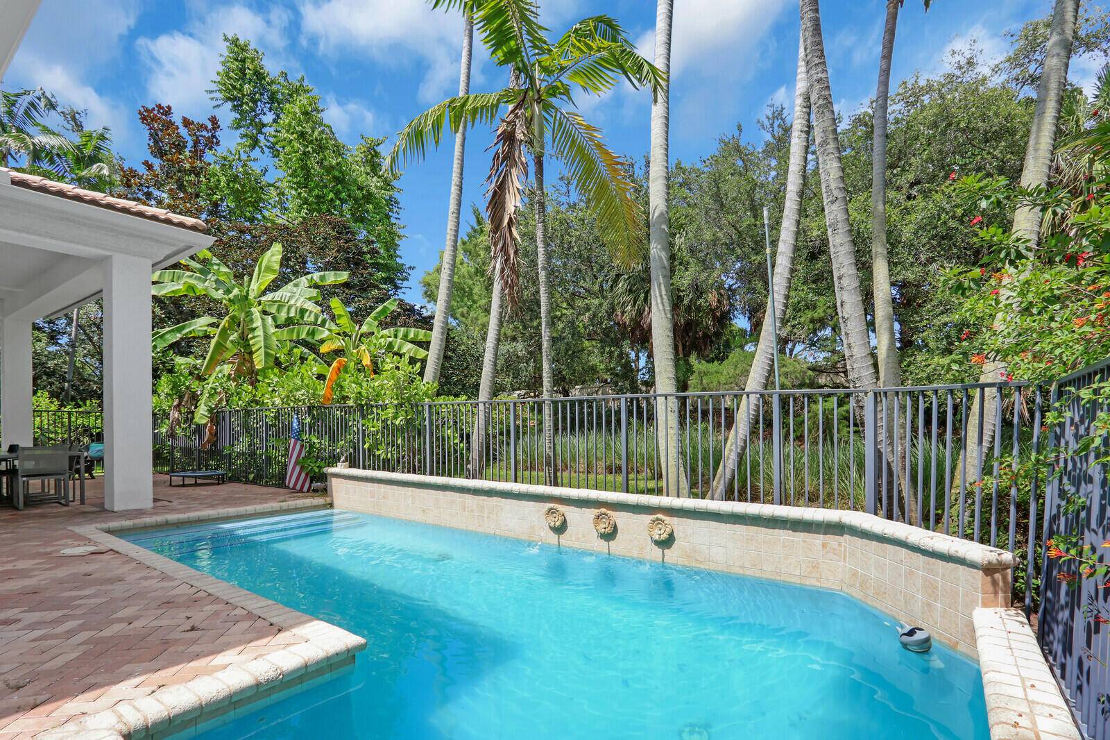 Stunning newly renovated 3 bedroom, 2 bath home situated in the heart of Palm Beach Gardens on one of the largest most tropical lush private lots in the popular Guard ...