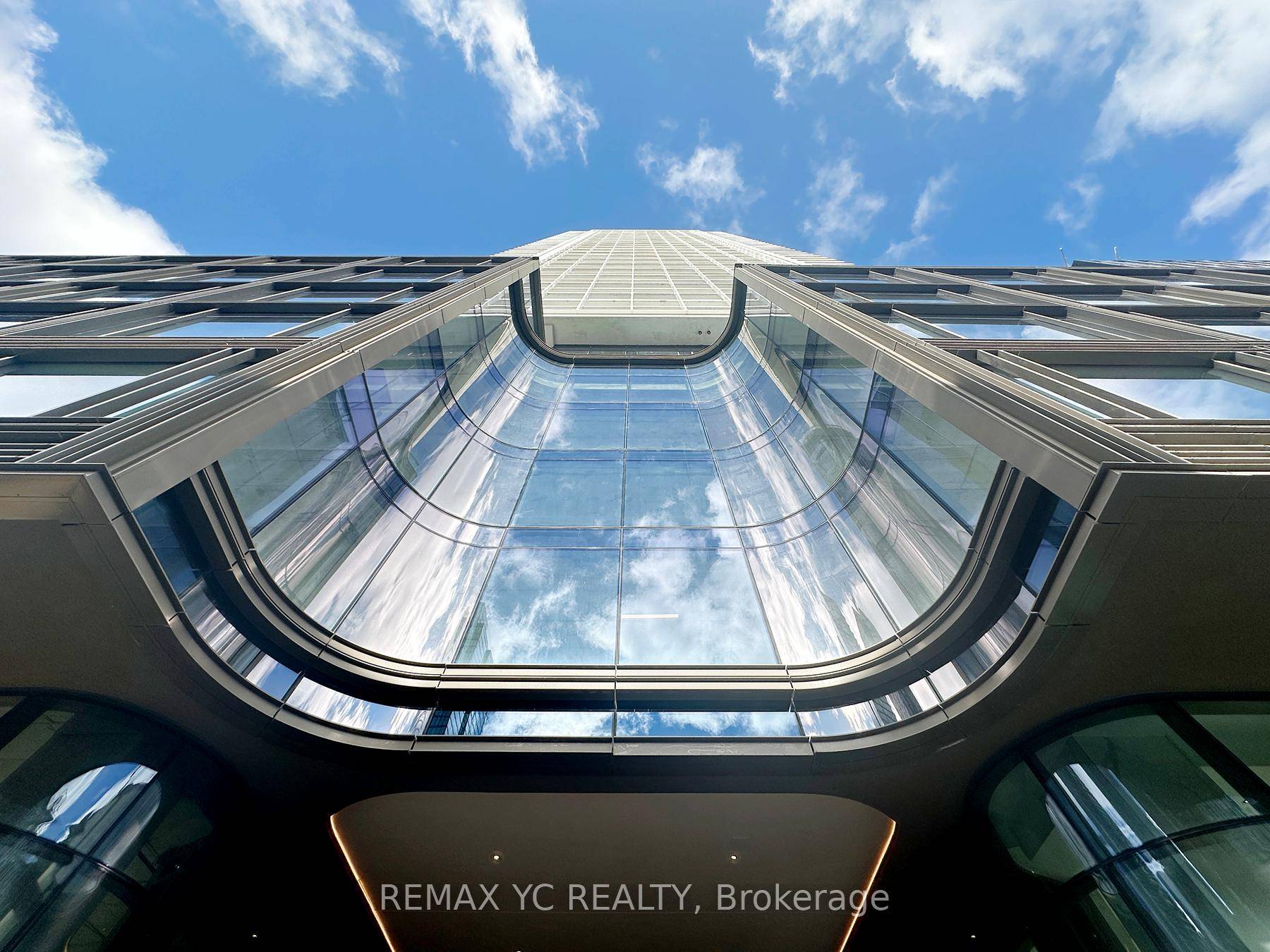 Experience luxury downtown living in this 2 bedroom, 2 bathroom condo on the 50th floor of 88 Queen St E, offering stunning south facing views of Lake Ontario and the ...