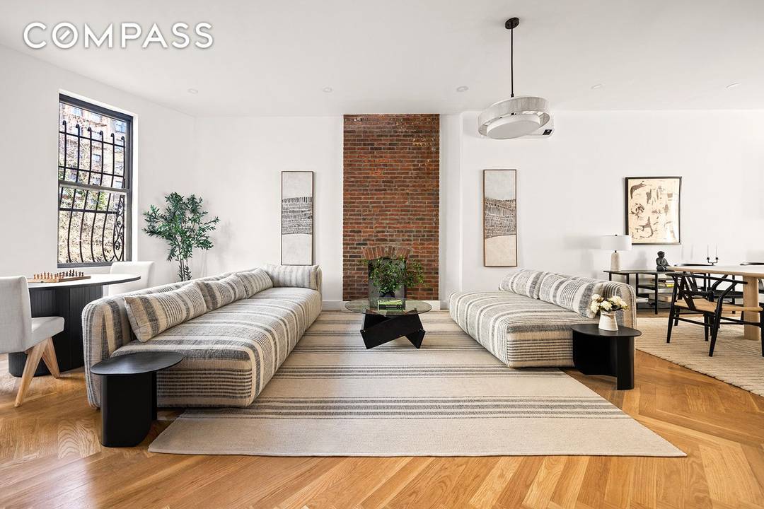 Stunning Renovated Two Family Riverside Drive Brownstone Welcome to this exquisite 12 room townhouse located on the prestigious Riverside Drive in Manhattan.