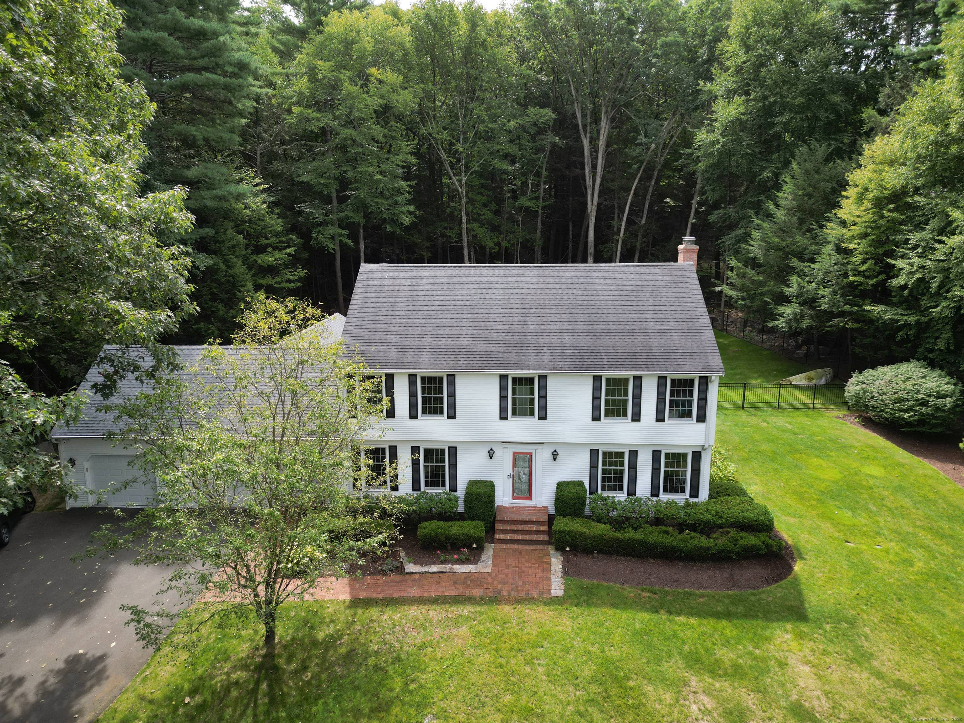 Welcome to 95 Cold Spring Road, where modern innovation meets timeless luxury in the heart of Avon, CT.
