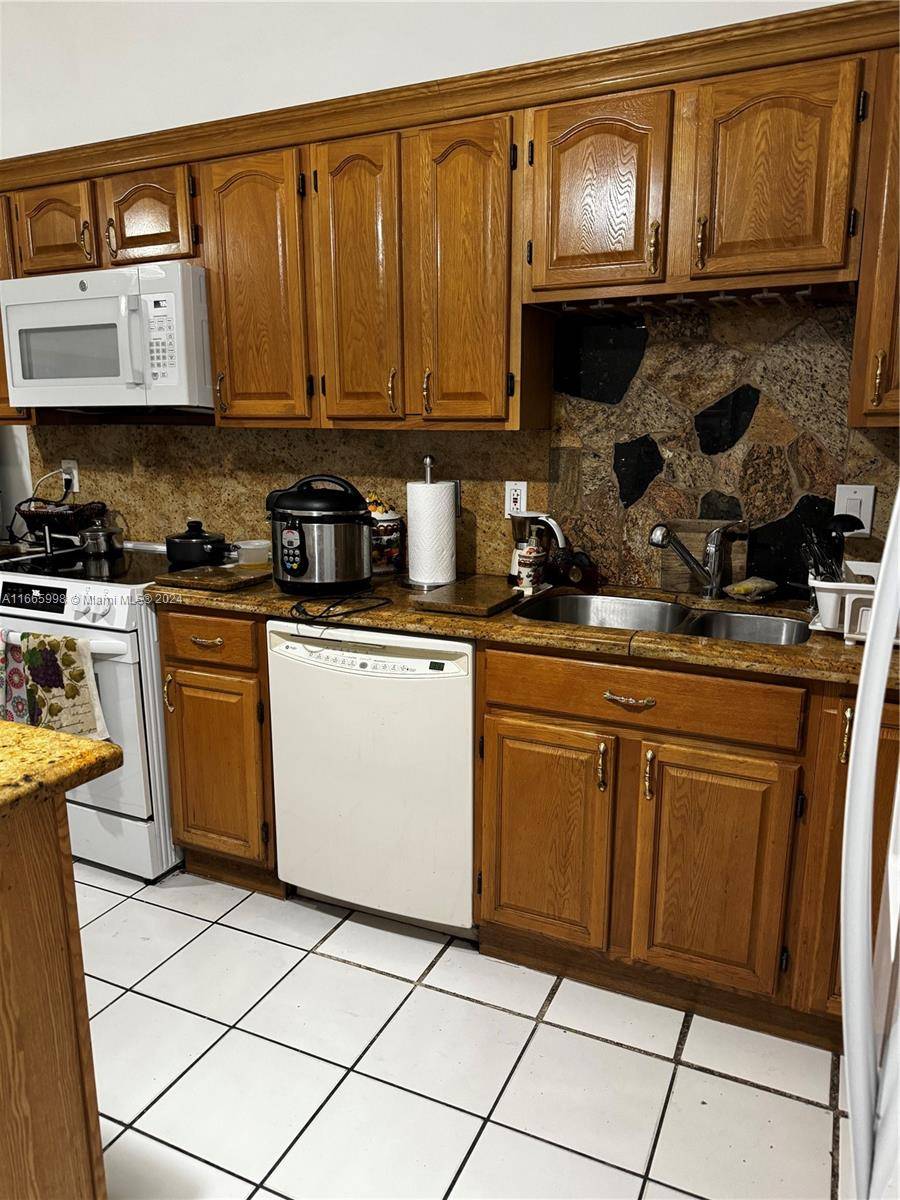 Charming 3 bedroom, 2 bath home centrally located in Hialeah Gardens, perfect as a starter home !