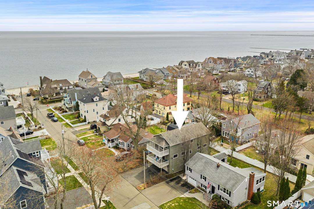 Just six homes from the shoreline, this kind of beach living feels effortless year round !