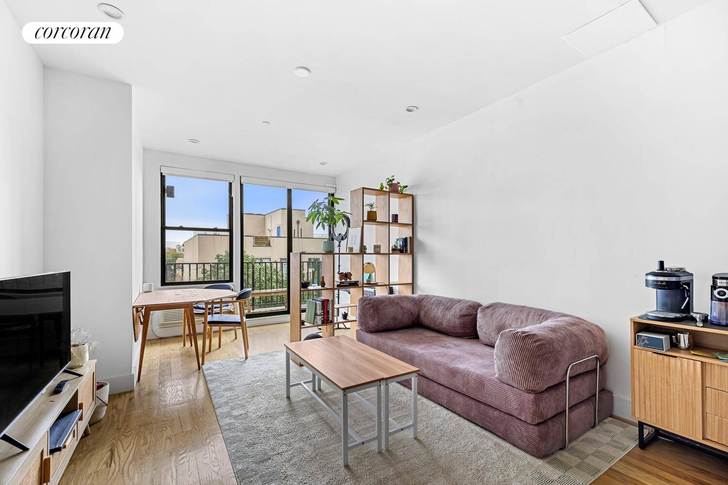 Step into your new haven at 27 Kossuth Place, Unit 4C !