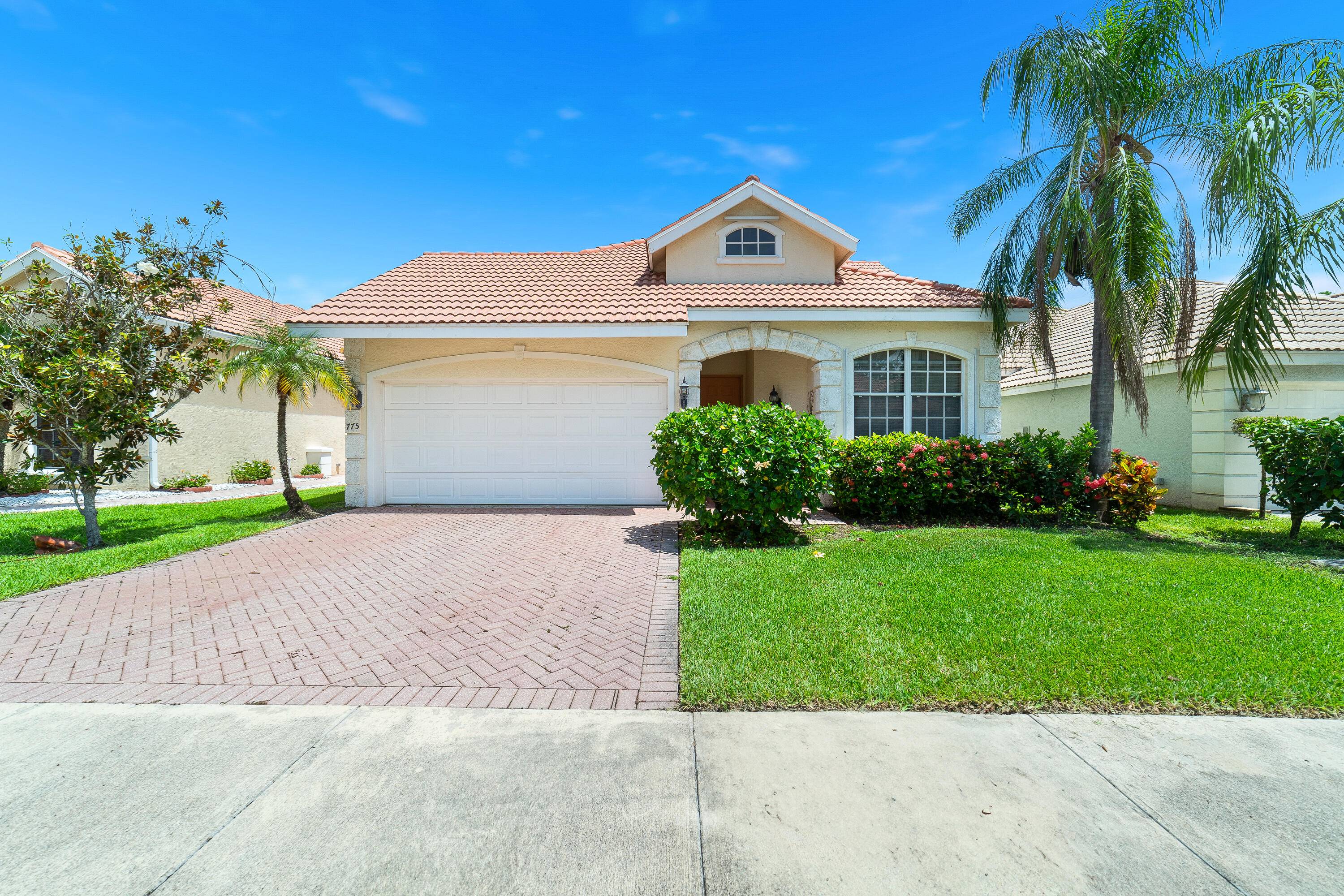 Welcome to this truly unique Courtyard Pool Home nestled in the highly sought after gated community of Lake Charles in St.