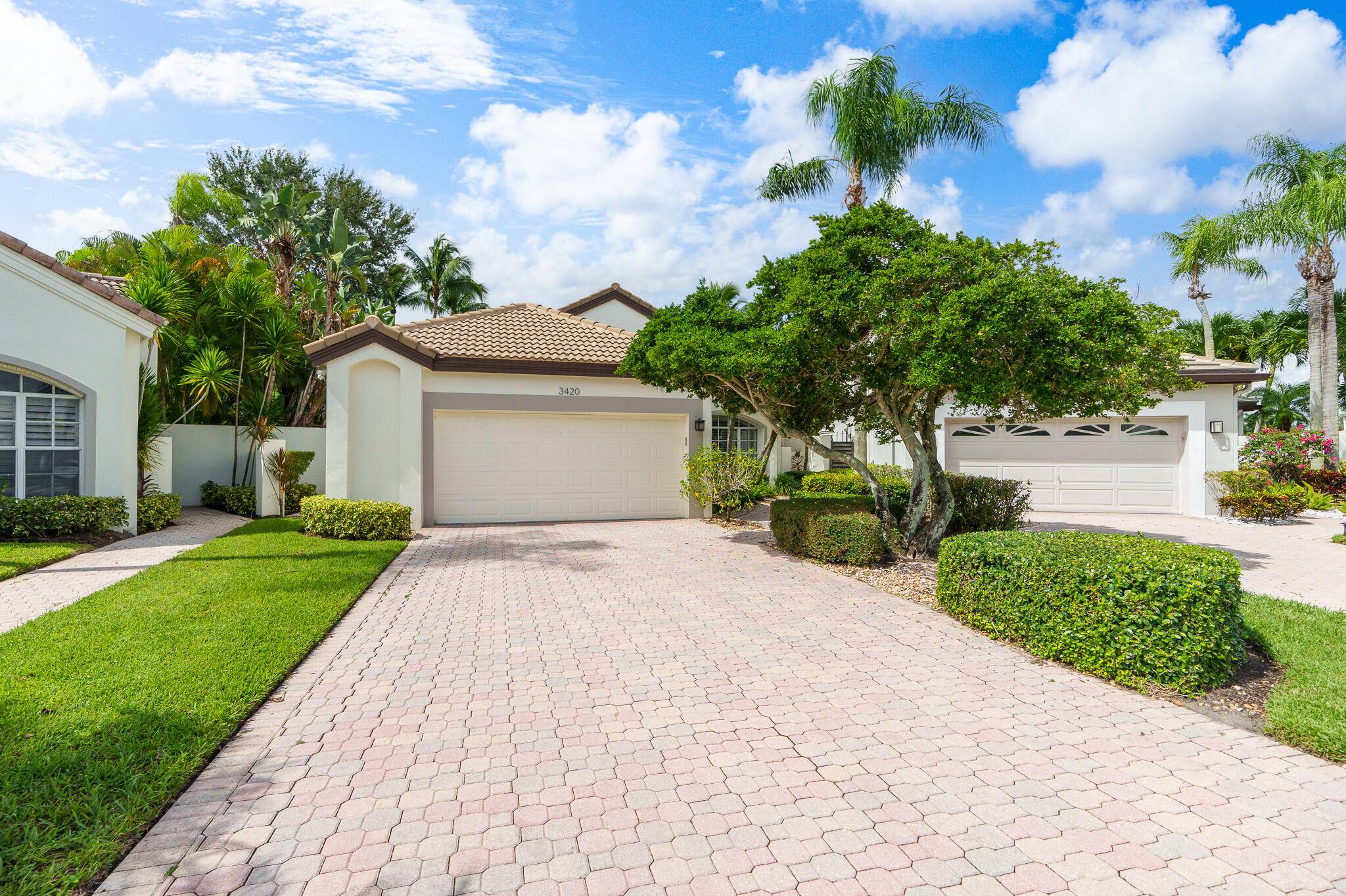 One Story home nestled on a rare oversized cul de sac lot in the sought after Woodfield Country Club ; Boasting 3 beds, 2.