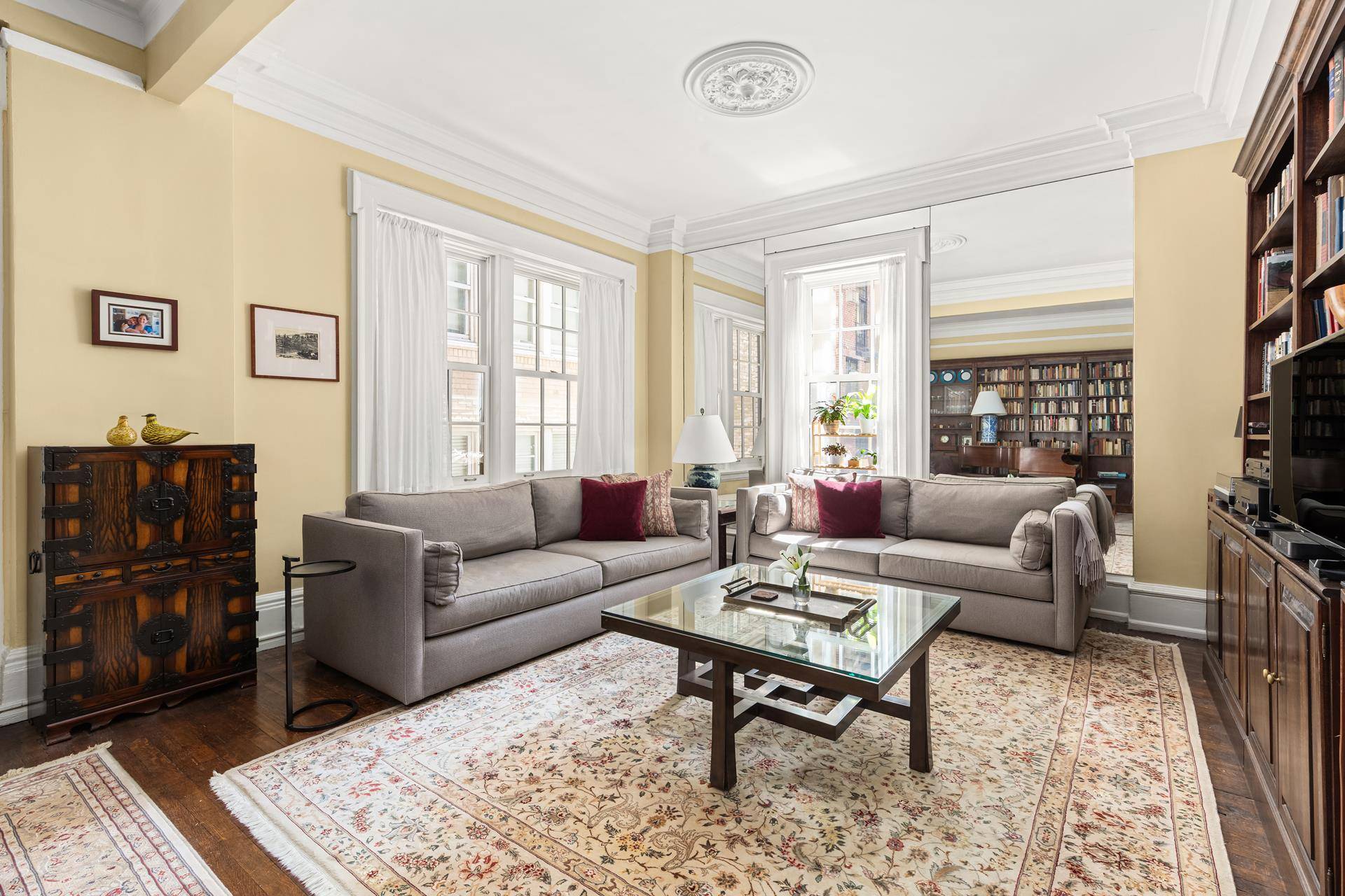 Located in one of Gramercy Park's most admired prewar buildings, this three bedroom, two bath duplex offers generous space, historic charm, and a key to the private park.