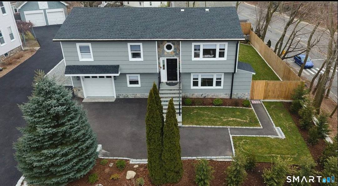 Welcome to 7 Dubois Street, a stunning fully renovated 4 bedroom, 2.