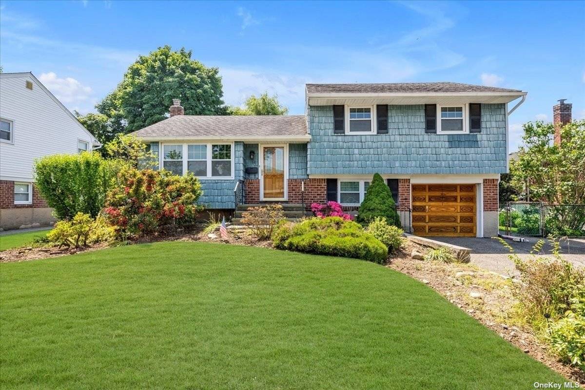 Lovely 3 Bedroom Split Level home offered in Plainview Bethpage SD.