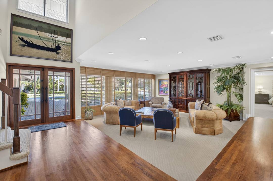 Rarely available 5 bedroom pool home on 1 2 acre in gated enclave of Oakbrook.