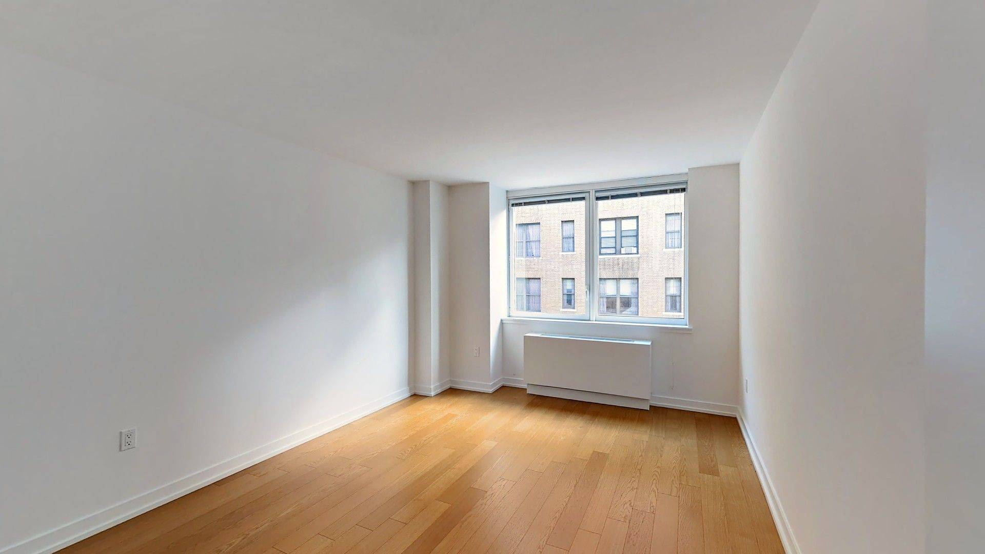 Great one bedroom featuring a gourmet kitchen with stainless steel appliances including a smart fridge with LCD display, stone countertops and an eating bar.