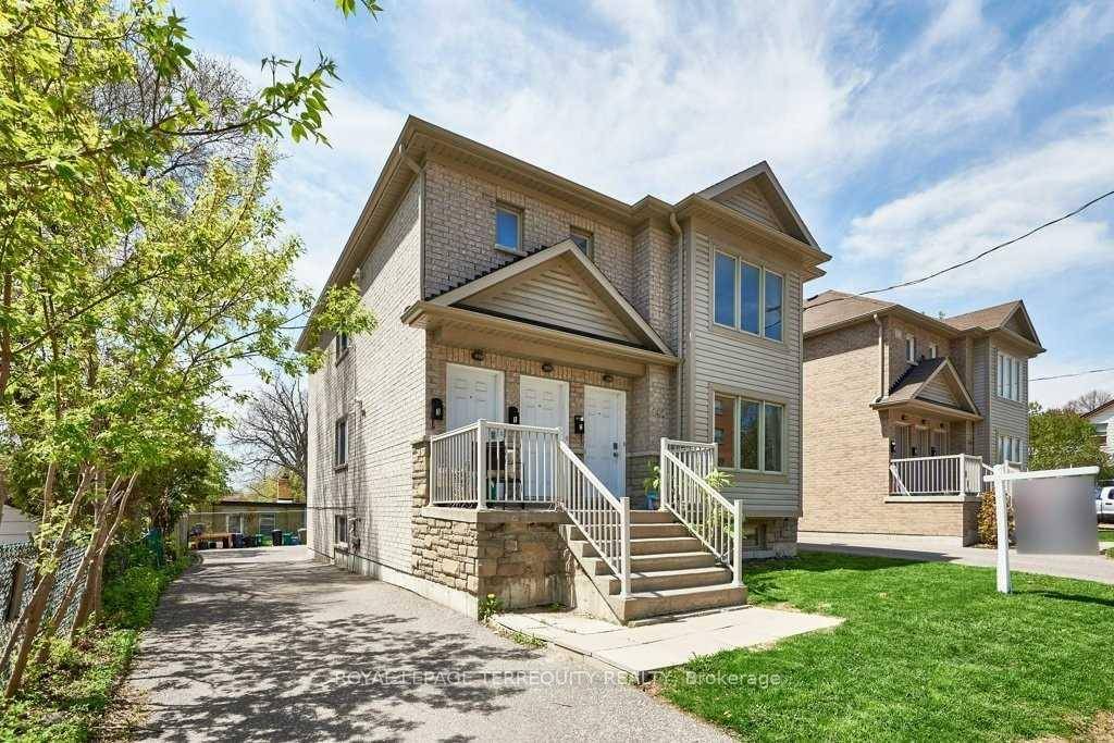 Investors Take Note ! 140 Mary Street North is a 12 year old, legal purpose built triplex.