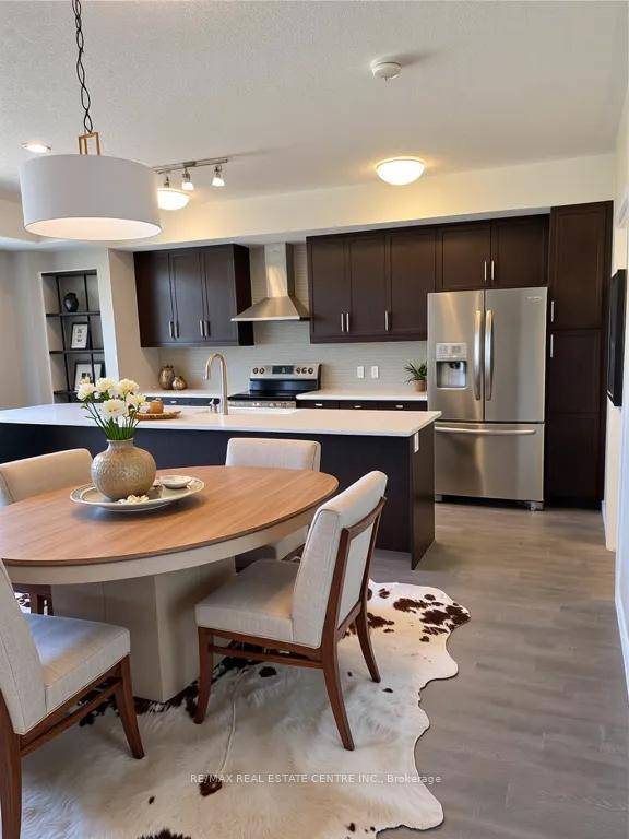 Discover modern living in this bright and spacious stacked condo townhome located in the highly desirable Huron Park community of Kitchener.