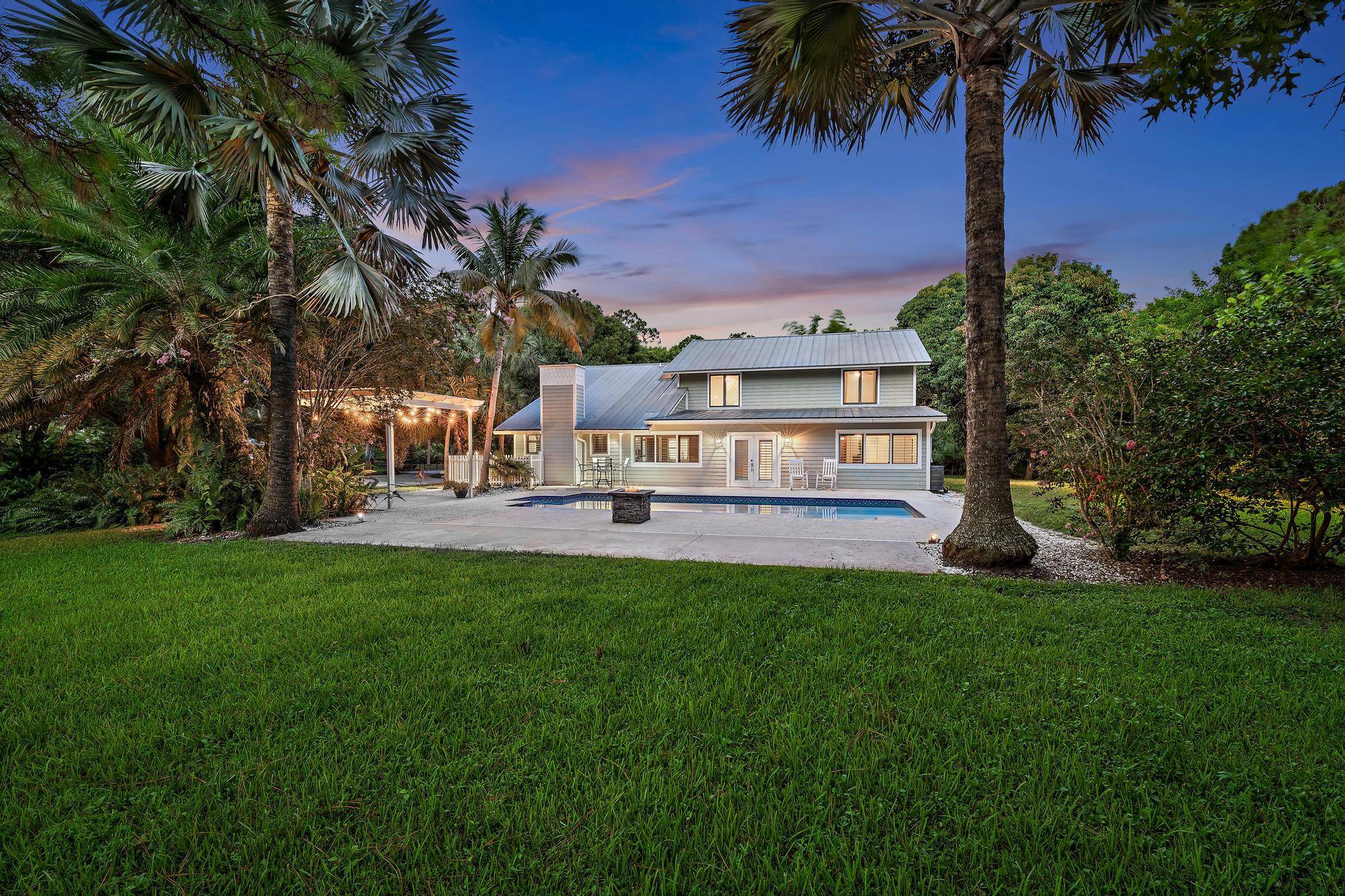 Rare 2. 5 Acre Private Oasis Equestrian Opportunity in a Highly Sought After Jupiter Location.