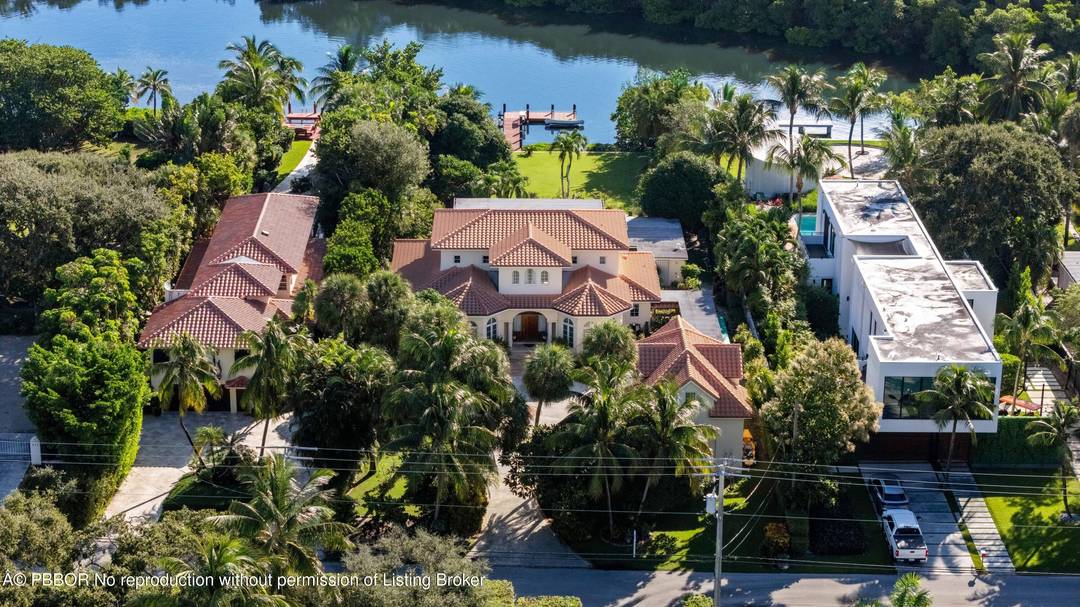 Experience unparalleled waterfront living on Hypoluxo Island !