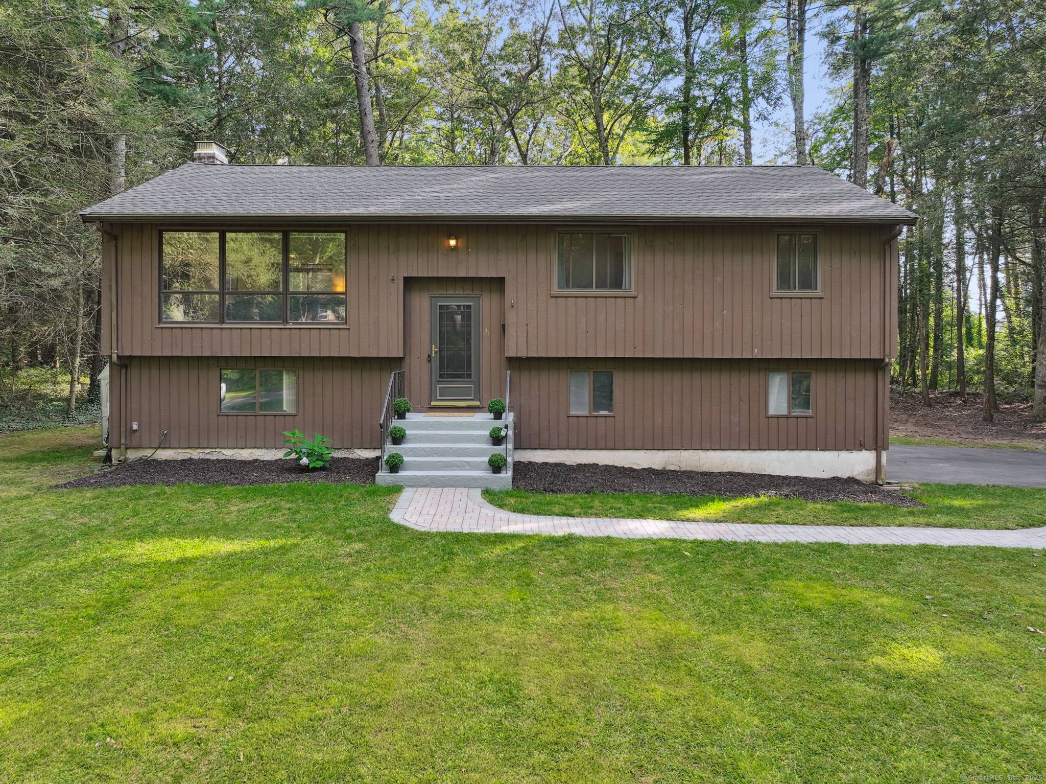 Serenely nestled within the Old County Estates neighborhood, 21 Berkshire Way is a raised ranch that feels like home from the moment you arrive.