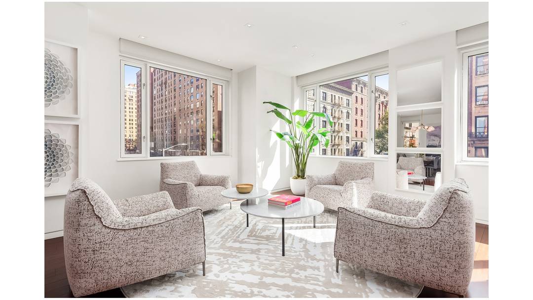 A rare offering in the heart of Carnegie Hill, this sophisticated duplex residence at 21 East 96th Street seamlessly blends classic proportions with contemporary refinement.