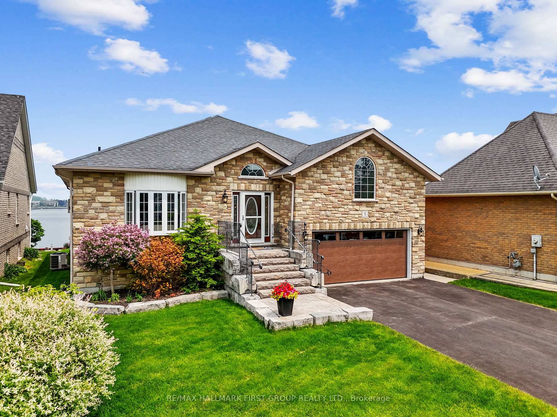 Situated on the shores of Lake Ontario in picturesque Presquile Bay, this beautifully updated home is a dream for those who love to live by and on the water.
