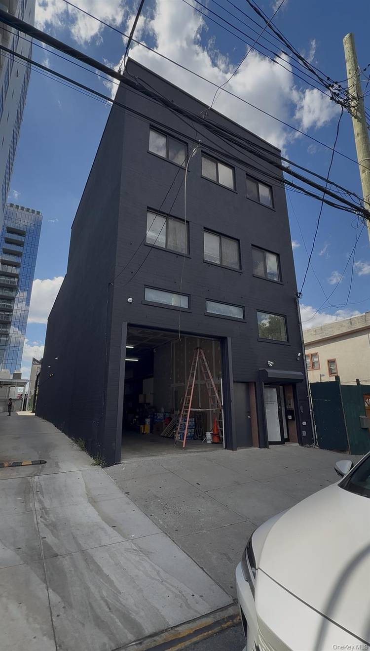 Rare high ceiling commercial opportunity in Flushing featuring approximately 16 foot ceiling heights and a full basement of comparable size, providing exceptional flexibility for warehouse, showroom, storage, distribution, light industrial, ...