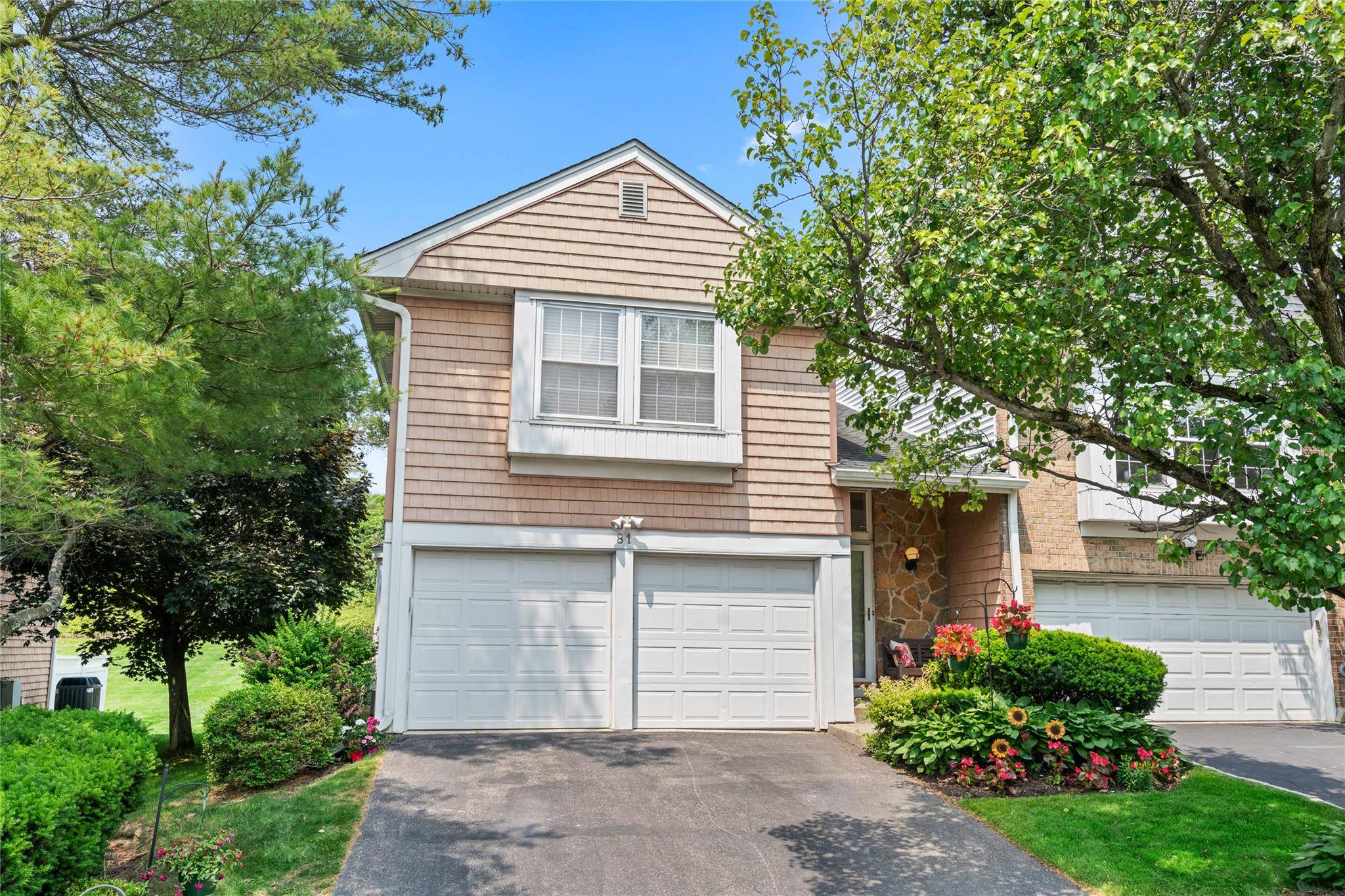 Welcome to this Stunning End Unit Vale Model in the Prestigious Guard Gated Community of Hidden Ridge !