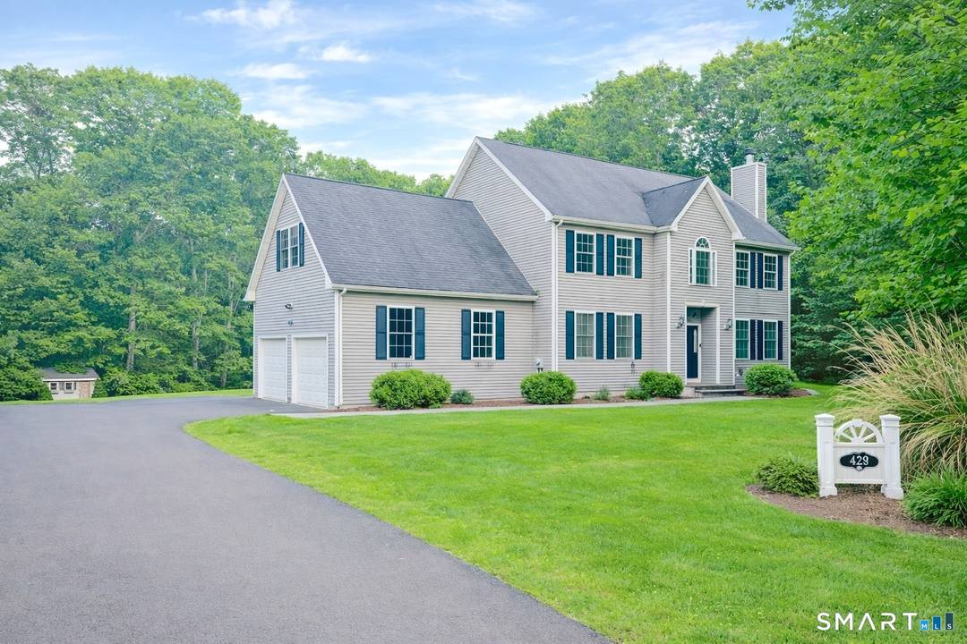 Welcome to 240 Tom Swamp Road, a rare opportunity to own a spacious and private home in one of Hamden's most sought after locations.