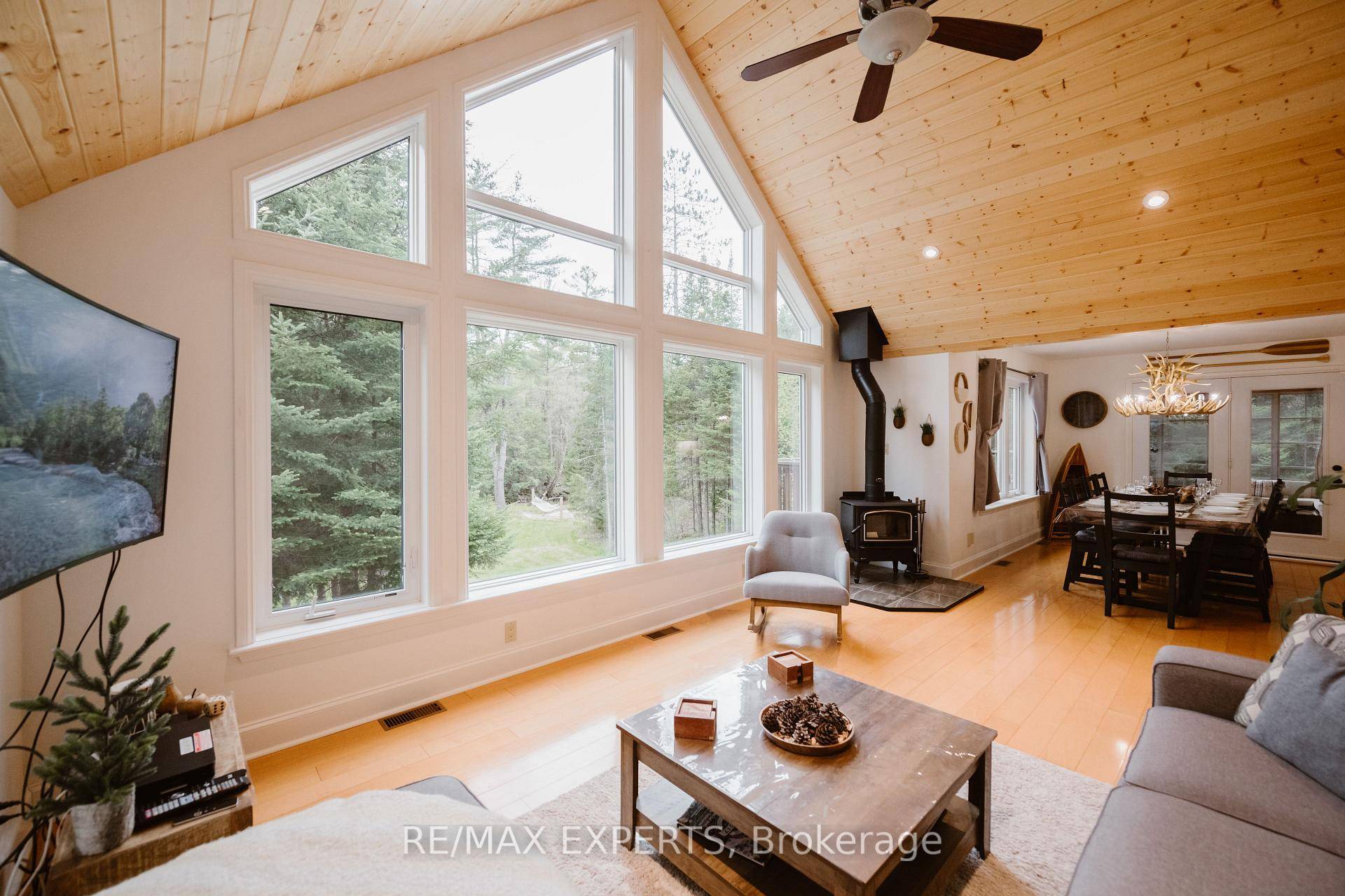 Welcome to This High Performing Short Term Rental A Private, Year Round Retreat on the Black River, Tucked away on 2 acres of beautifully treed land, this private amp ; ...