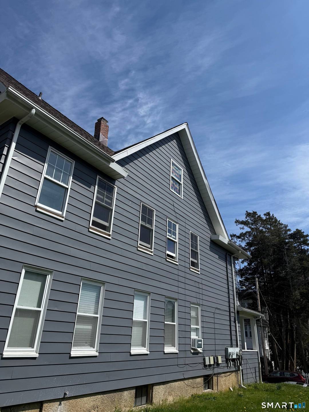Renovated three family property offering strong income potential or ideal owner occupied living.