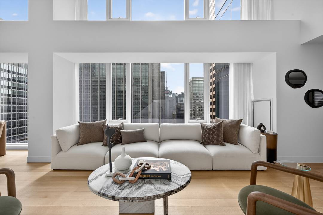 The Residence Spanning two thoughtfully arranged levels, the layout creates a clear distinction between entertaining and private quarters a rare advantage in condominium living.