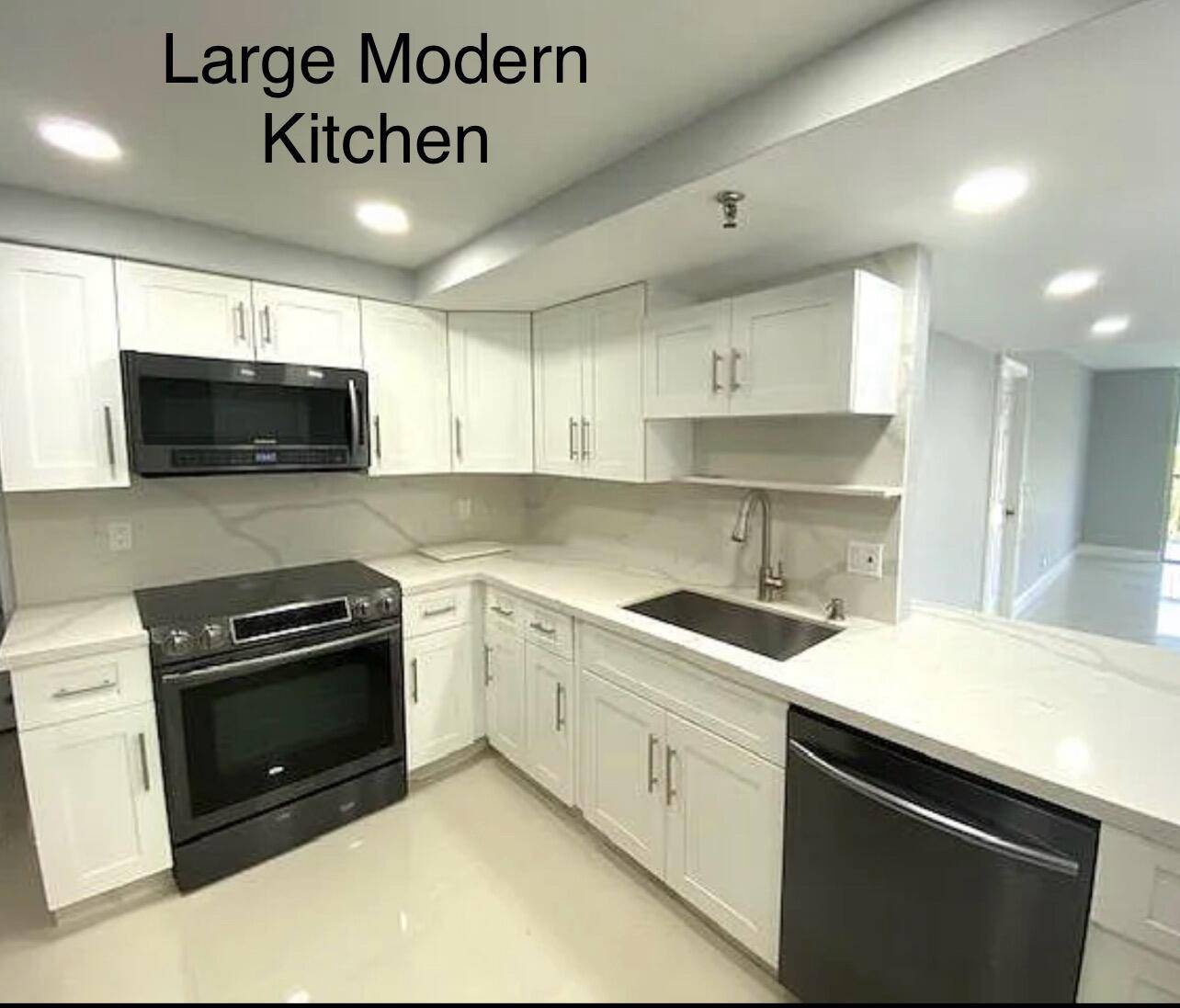 Beautifully updated modern 3Br 2Ba condo with large kitchen that features includes self close cabinetry, stainless steel appliances, Calcatta Quartz premium countertops, coffee or wine bar area w beverage fridge ...
