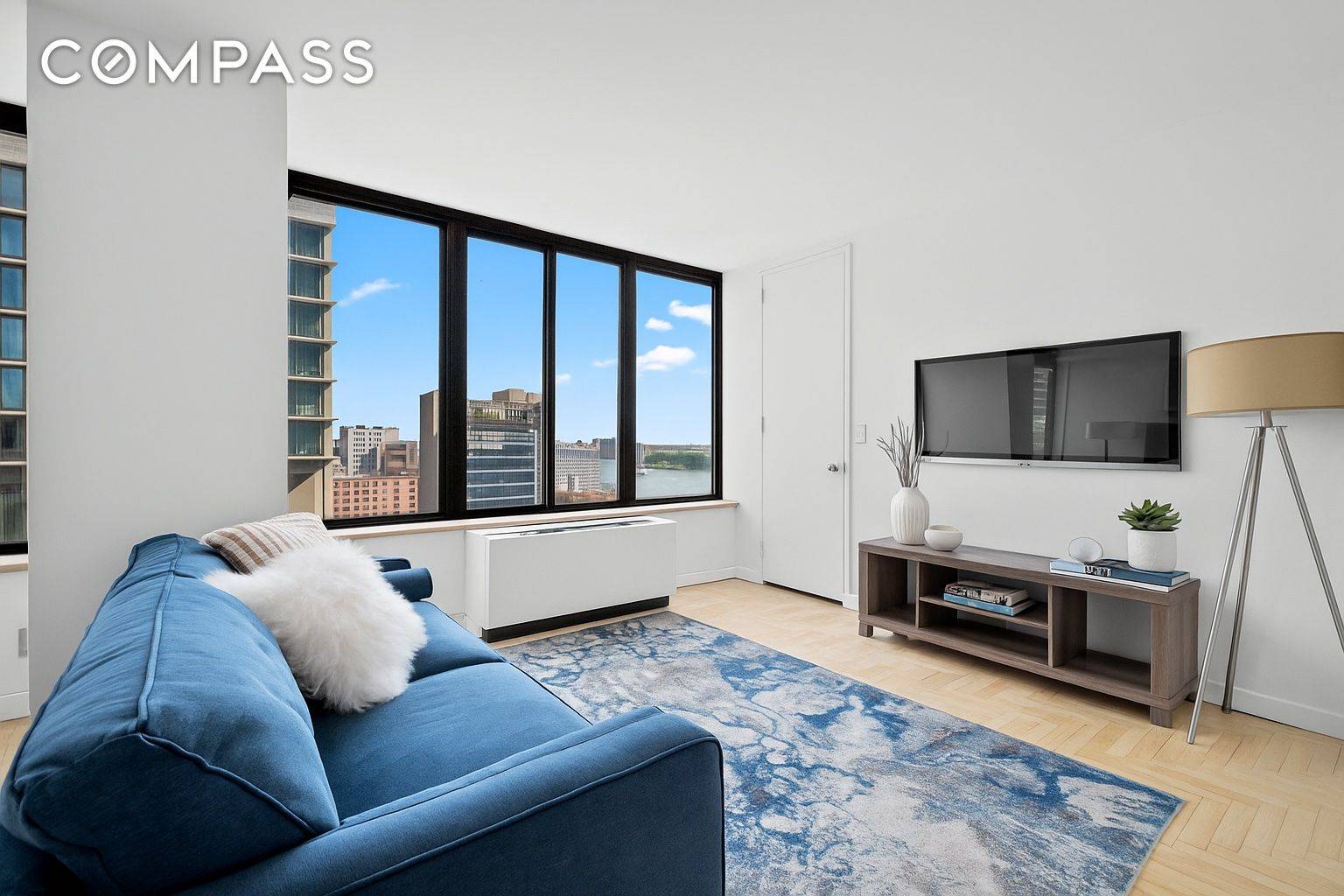 Welcome to this sun filled studio condominium, perfectly perched on the Upper East Side with stunning views of the City and the East River.