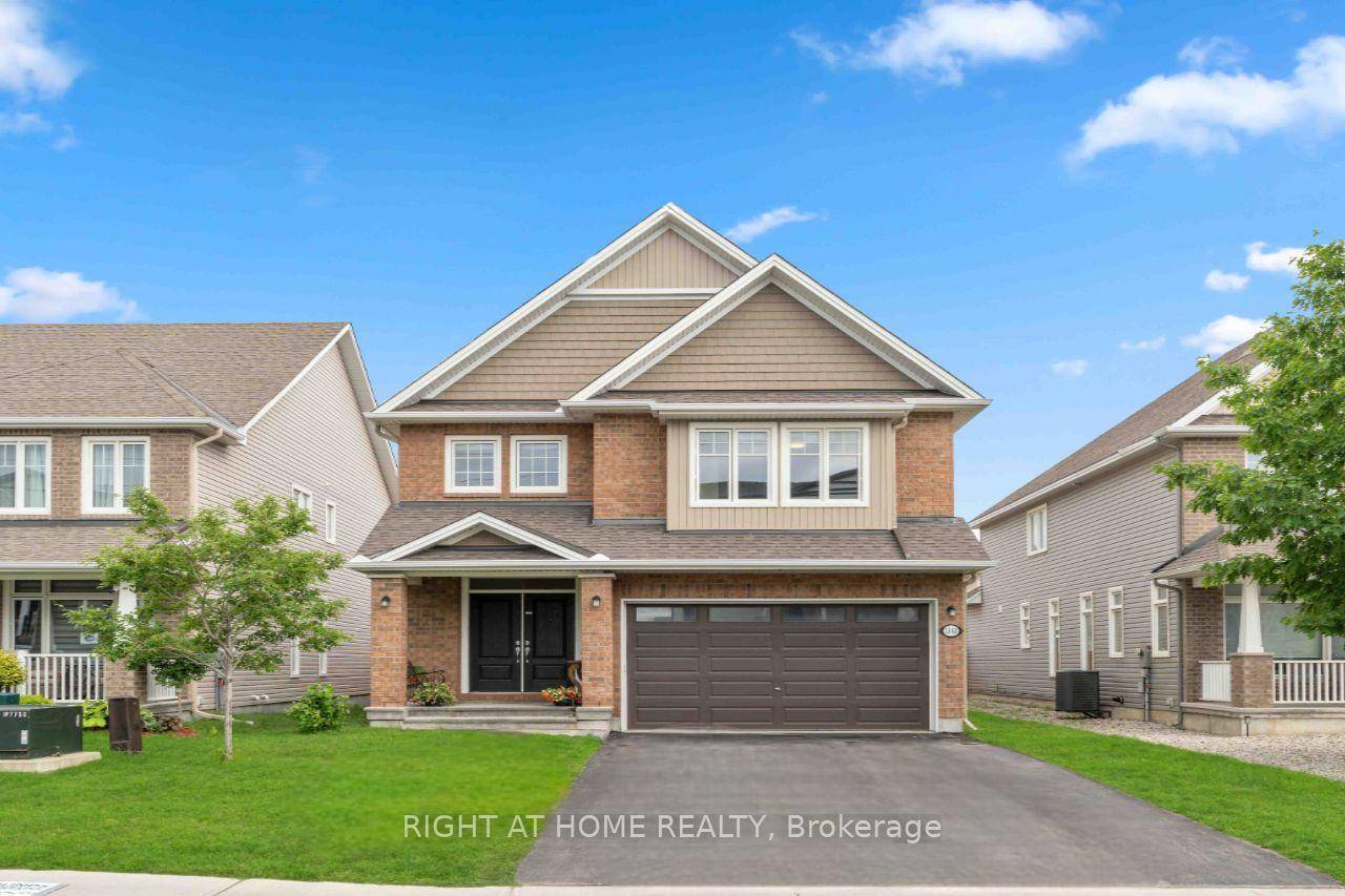 Stunning, Energy Star certified, Hartland model by Tamarack, offering over 2, 600 sq ft of elegant living space plus a fully finished basement on a premium wide lot.