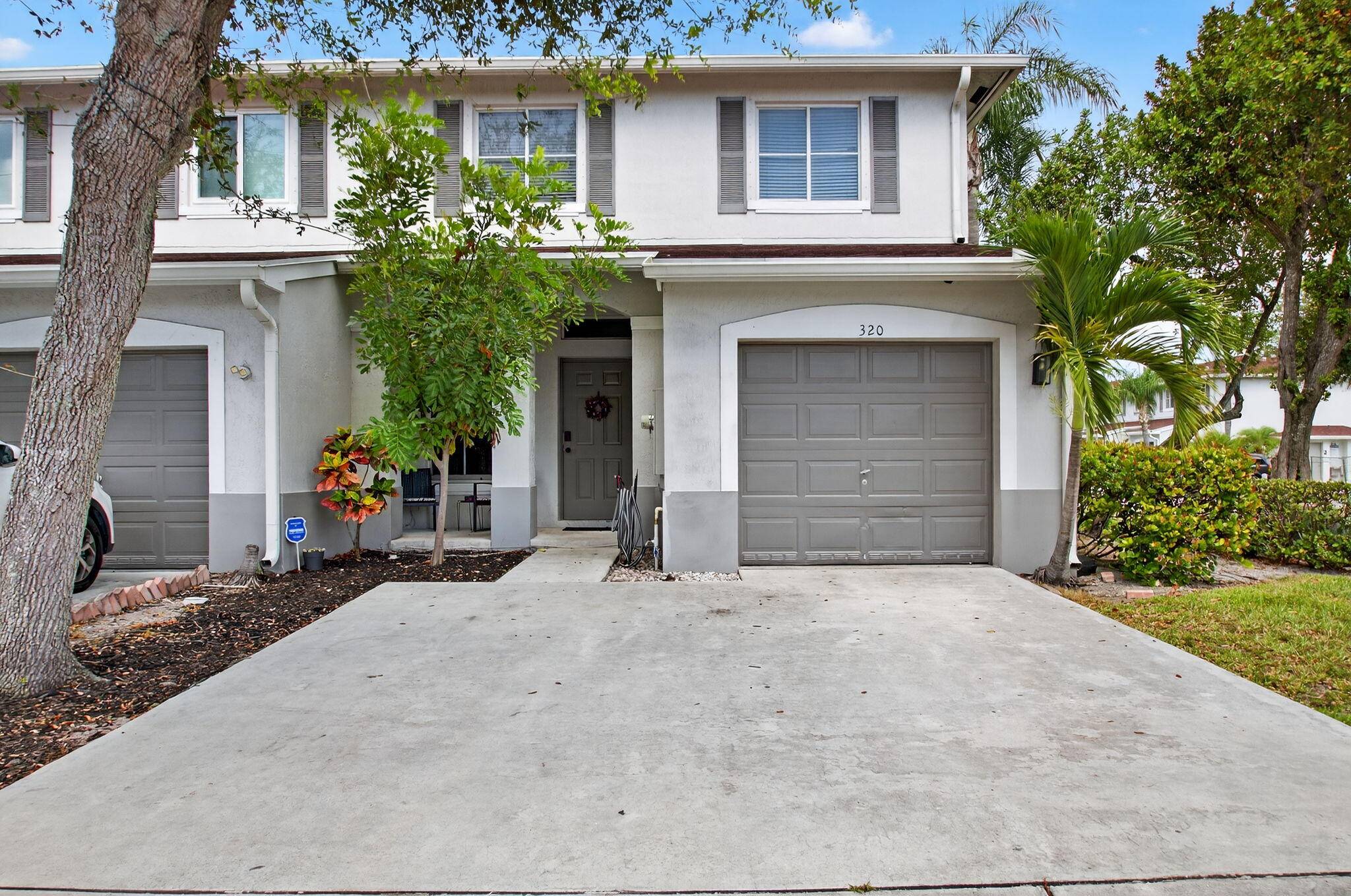 Welcome to this beautifully updated corner unit townhouse nestled in the heart of Palm Springs.