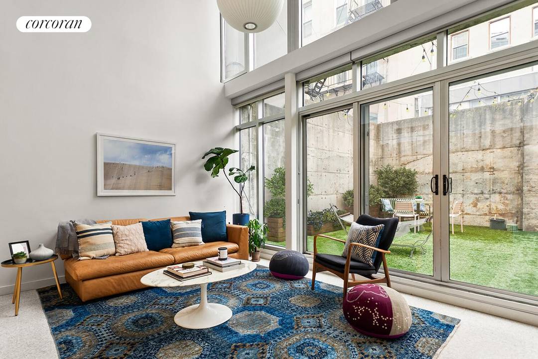 Welcome home to 23 Garfield Place, a stunning, and newly renovated, two bed, two bath duplex with double height ceilings, a spacious backyard, and parking available for purchase !