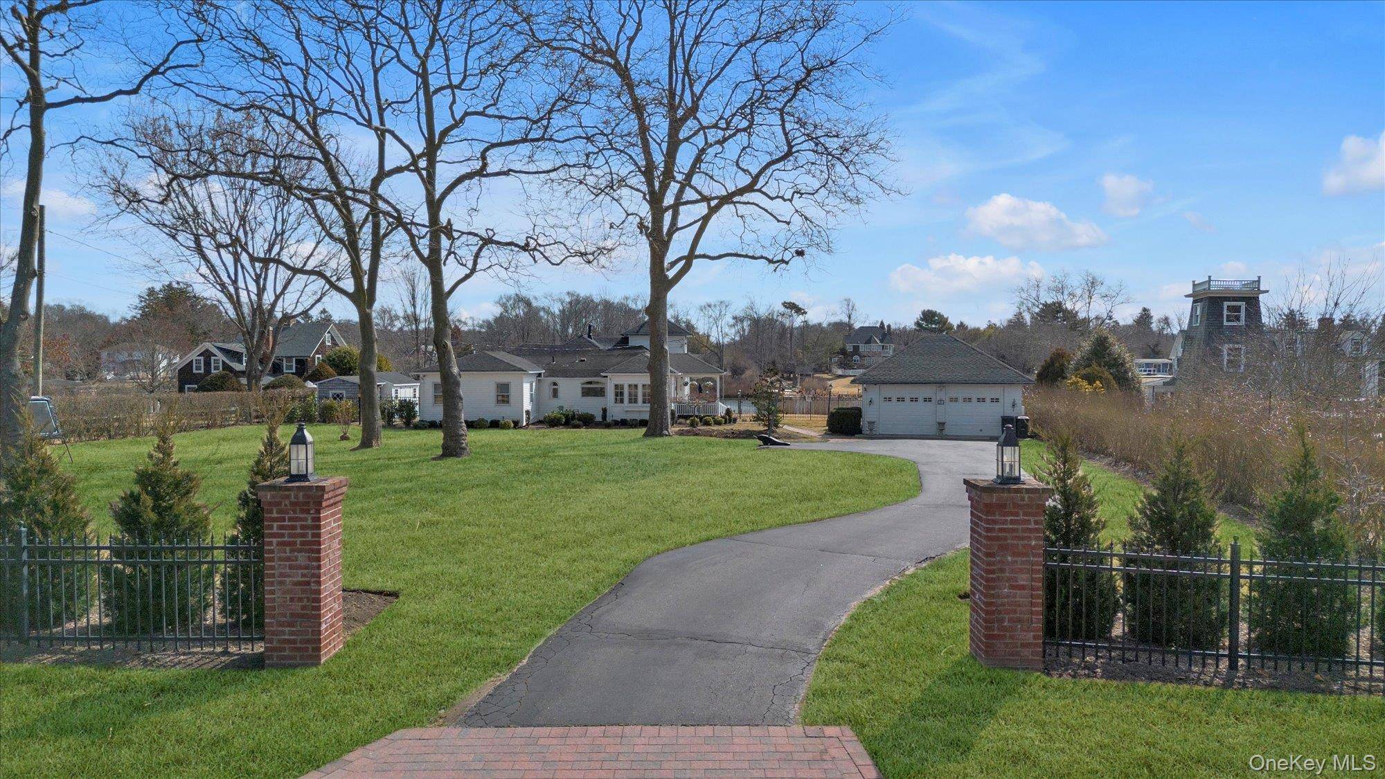 Prime location for this waterfront estate nestled on 1.