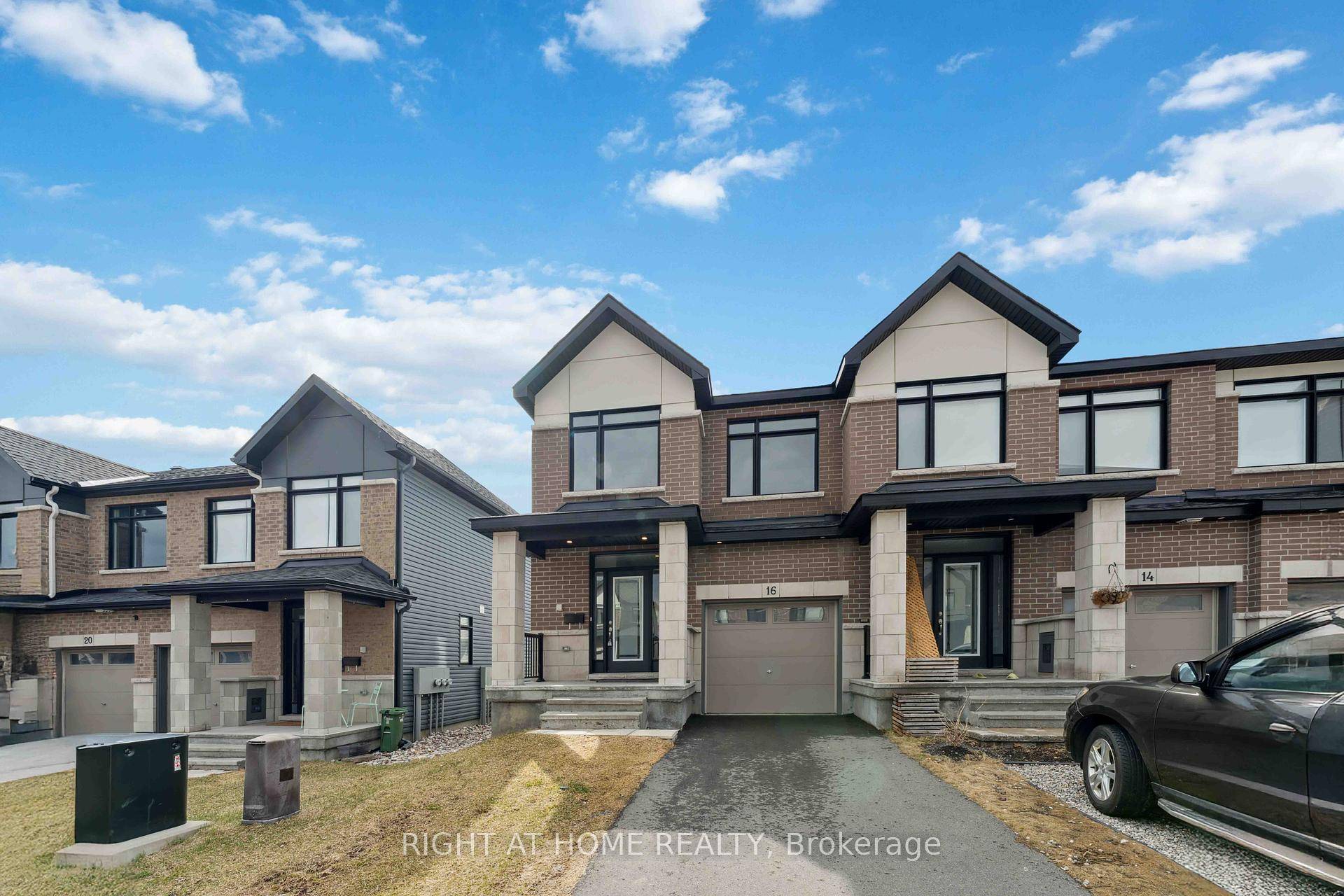 Step into this stunning, newer end unit townhome that perfectly blends modern design and luxury living.