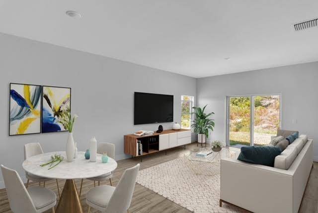 NO HOA AMAZING NEW CONCRETE BLOCK CONSTRUCTION READY SOON with 3 bedrooms, 2 baths, all tile flooring, impact windows, granite counter tops, volume ceilings and more in a country setting ...