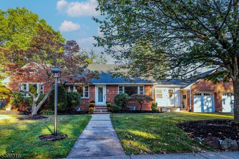 Beautifully updated and expanded 4 bedroom raised ranch set on an extra large property just minutes from NYC trains and all the restaurants, shops, and energy of Main Street Metuchen.