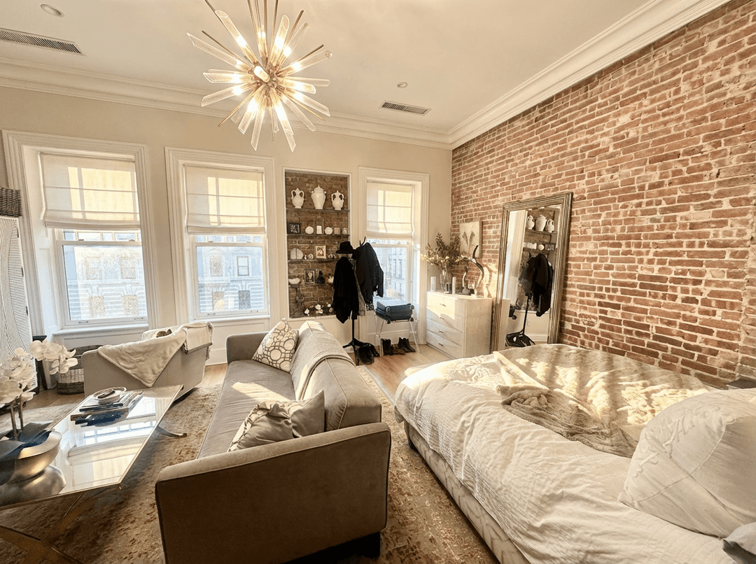 Bright, Renovated Studio with Exposed Brick in Prime Upper East Side Location Welcome home to this sun filled, thoughtfully laid out studio on iconic Madison Avenue.