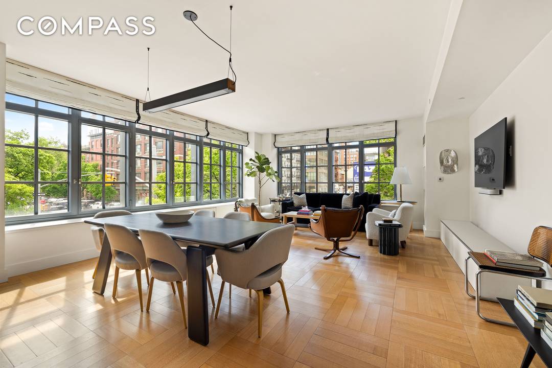 Welcome to 500 West 21st Street, Residence 2G a sun filled corner two bedroom perched above the treetops of West Chelsea.
