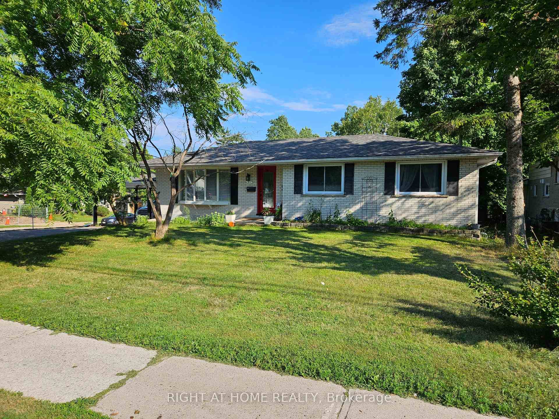 Charming Ranch Bungalow Featuring A Separate Entrance Leading To A Newly Updated Law Suite 2022 With two Bedrooms and Den, Main Level Complete With A Spacious Kitchen, Dining Room, An ...