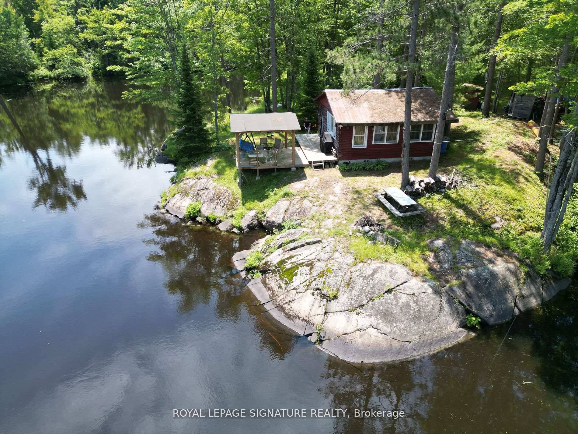 WATER ACCES ONLY Waterfront getaway at the edge of the Skootamatta river.
