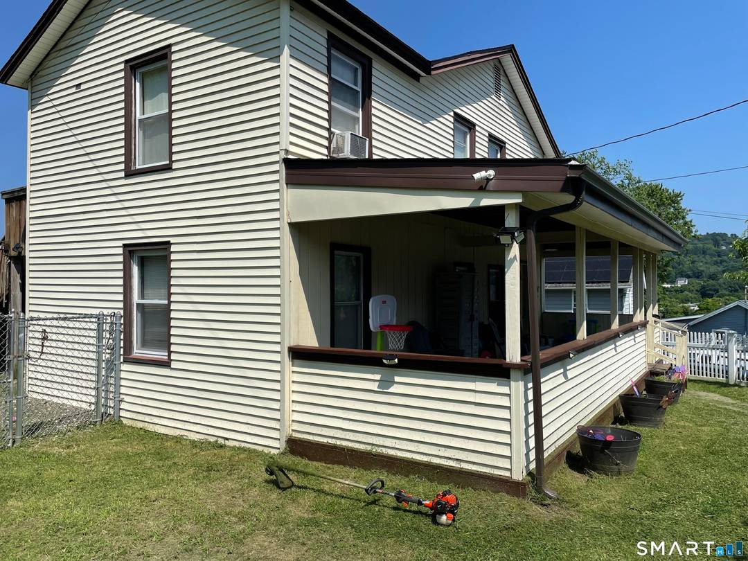 Unique Opportunity with Flexible Layout and Oversized Garage.