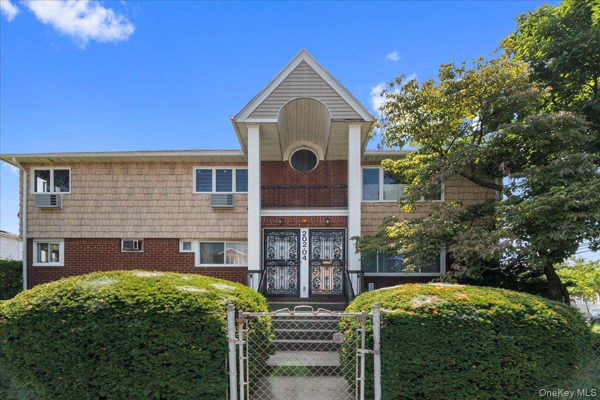 Spacious detached two family home on a 50x100 corner lot in Bayside with a house size of 26x47.